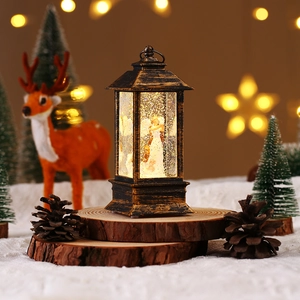 Close-up of bronze vintage Christmas lantern with internal light and resin figurine