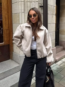 Women's oatmeal beige wool bomber jacket with zip closure and flared hem in outdoor setting
