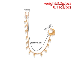 Detailed view of punk gold chain ear cuff with round metallic beads and size measurements