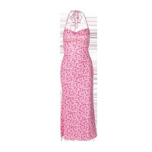 Detail of pink floral halter dress showing the backless design with tie-up straps
