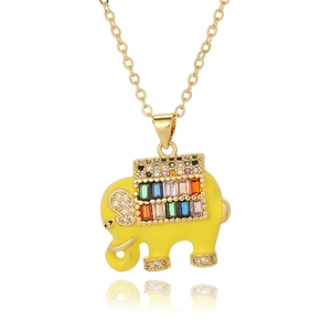 Macro shot of an elephant pendant with colorful cubic zirconia and yellow enamel detail
