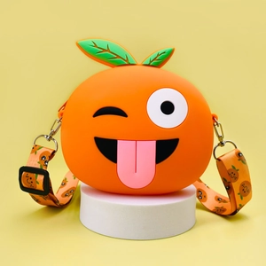 Funny orange silicone crossbody bag for kids with expressive face and patterned strap