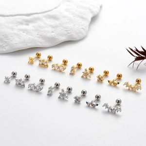 Stainless steel cartilage earring set with cubic zirconia in star and crown designs