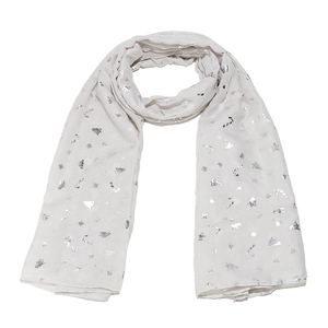 Close-up of silver Christmas tree and snowflake patterns on light gray festive scarf
