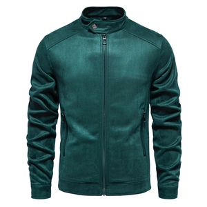 Macro shot of teal faux suede jacket details showing stand collar and metal zipper texture