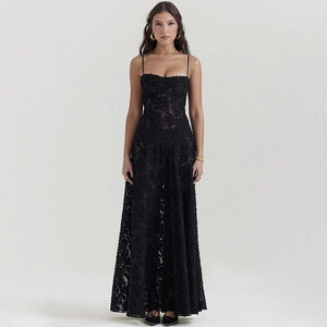 Detailed view of the 3D floral lace texture and embroidery on this elegant black gown