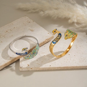 Elegant 18K gold-plated peacock enamel open bangle with intricate colorful feather details