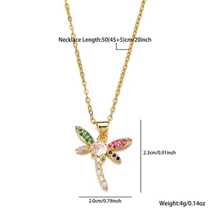 Detailed macro view showing a dragonfly pendant with colorful zircons and size specifications