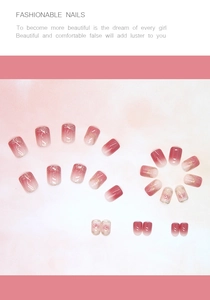 Detail of pink gradient press-on nails featuring glitter accents and marble texture