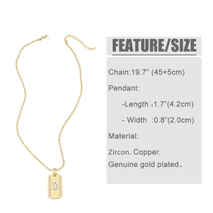 Detail showing golden letter D pendant with dimensions 4.2cm x 2.0cm and bead chain