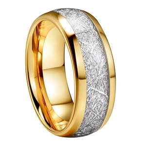 Detailed view of bicolor men's ring with silver meteor pattern and golden steel edges