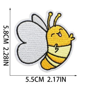 Detailed view of yellow cartoon bee embroidery patch with 5.8cm by 5.5cm dimensions