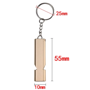 Detail view of gold dual-tube survival whistle with precise 55mm and 25mm dimensions