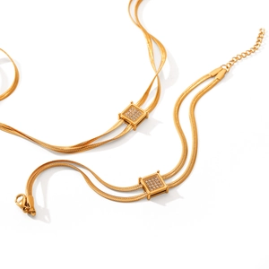 Gold double-layered snake chain necklace and bracelet set with square zircon pendant