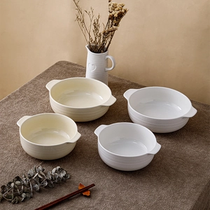 Set of four ceramic soup bowls with handles and spiral texture in beige and white