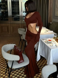 Deep burgundy long sleeve floor-length dress with asymmetric side cut-out design