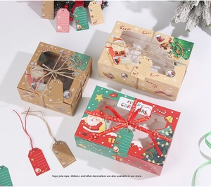 Christmas cupcake boxes with window display featuring festive reindeer and Santa motifs