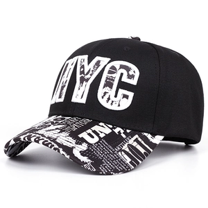 Hip hop snapback hat featuring black crown with NYC embroidery and graffiti printed brim