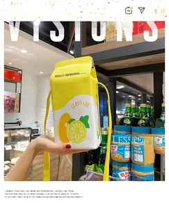 Creative lemon milk box crossbody bag with hand-drawn fruit print and adjustable strap