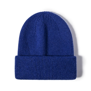 Winter rib-knit dark blue beanie hat with thick double-fold cuff for outdoor warmth