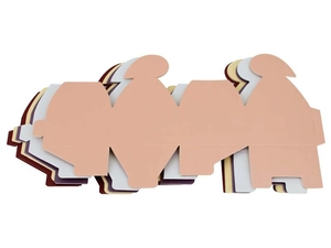 Flat lay of unassembled pearl paper gift box sheets in various soft pastel colors