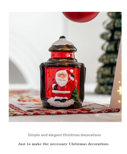 Detail of red vintage Christmas lantern with Santa Claus and starry cutout design