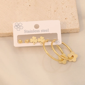 Gold stainless steel earring set featuring clover studs and flower hoop pendants