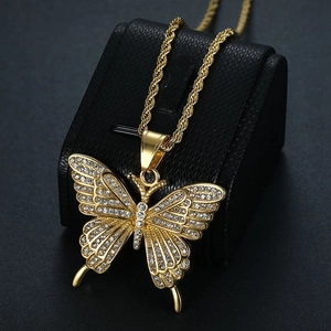 Gold butterfly pendant necklace with sparkling cubic zirconia on a twisted rope chain