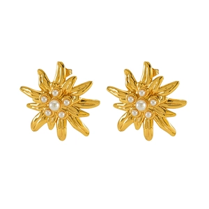 Vintage gold starburst earrings with white pearls and polished floral geometric petals