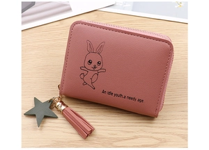 Pink PU coin purse detail featuring rabbit print, tassel charm and star pendant