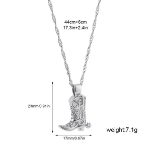 Detailed view of silver cowboy boot pendant showing intricate engraving and dimensions