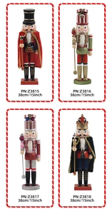 Detail view of four 15-inch wooden nutcracker soldiers with glitter and fabric capes