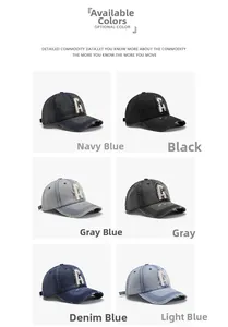 Detail of vintage washed denim baseball caps with letter A patch in six various colors