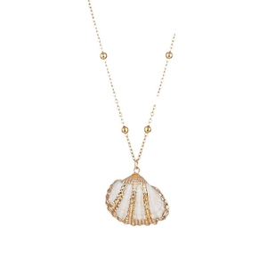 Elegant gold-plated shell pendant necklace with small gold beads on white background
