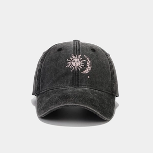 Washed black cotton baseball cap featuring sun and moon embroidery in retro style