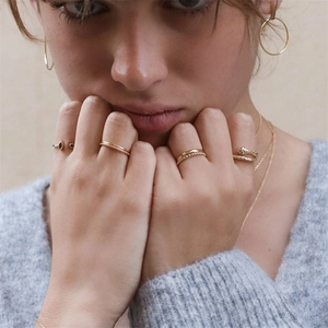 Minimalist S925 sterling silver snake ring and jewelry set worn by a female model