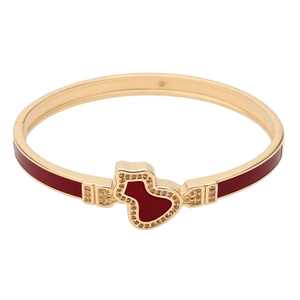18k gold plated calabash bangle with red enamel and pavé crystals on white background