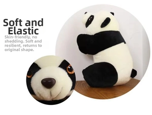 Close-up of cute giant panda plush toy showing soft texture and premium facial details