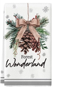 Detail of Forest Wonderland print on white microfiber kitchen towel with pine cones