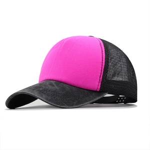 Detail of pink foam front and black breathable mesh back on the adjustable trucker cap