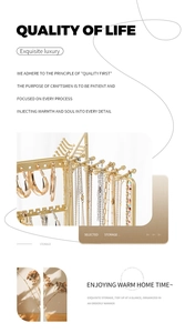 Rotating gold metal jewelry display stand with solid wood base for necklaces and earrings