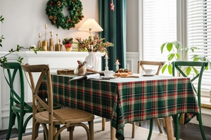 Detailed view of festive red and green plaid tablecloth made of cotton linen fabric