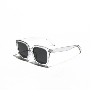 Fashionable oversized square sunglasses with transparent frames and dark lenses