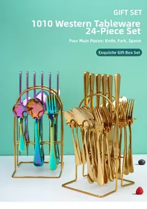 Macro detail of 24-piece stainless steel cutlery set featuring gold mirror finish and storage rack