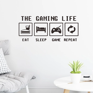 The Gaming Life wall sticker featuring icons for eat, sleep, game, and repeat above a sofa