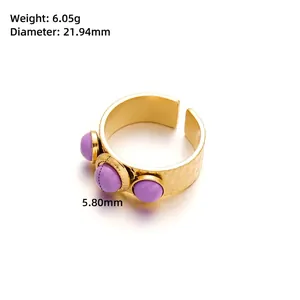Detail of gold hammered ring with purple stones showing weight 6.05g and diameter 21.94mm