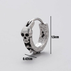Close-up of gothic skull earring showing 1.5cm height and 0.42cm width dimensions