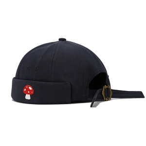 Unisex navy canvas brimless docker hat featuring a small red mushroom embroidery patch