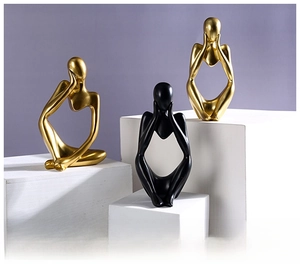 Modern abstract thinker statues in gold and black finish for creative home shelf decor