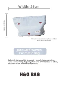 Size details of blue striped cosmetic bag with bow embroidery and cream canvas lining